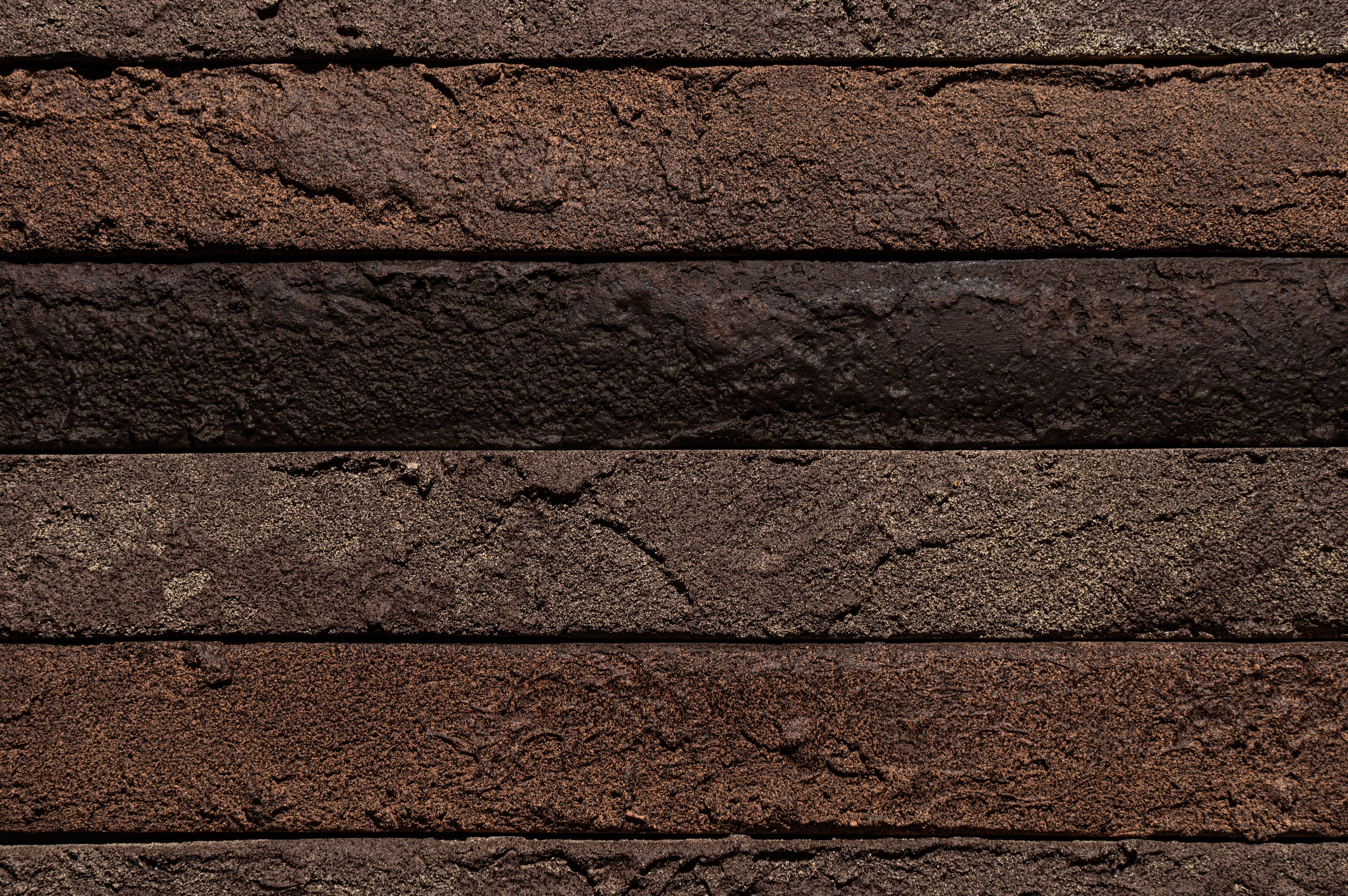 Фасадна плитка Rockface™ Рокфейс 539 темно-коричневий з меланжем, 535х40х20мм